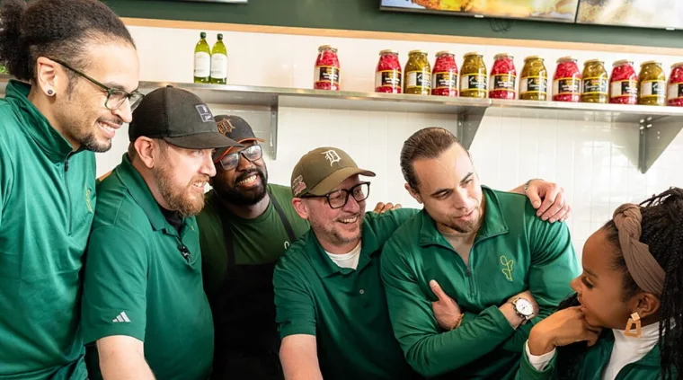 The Breadless team together at a restaurant